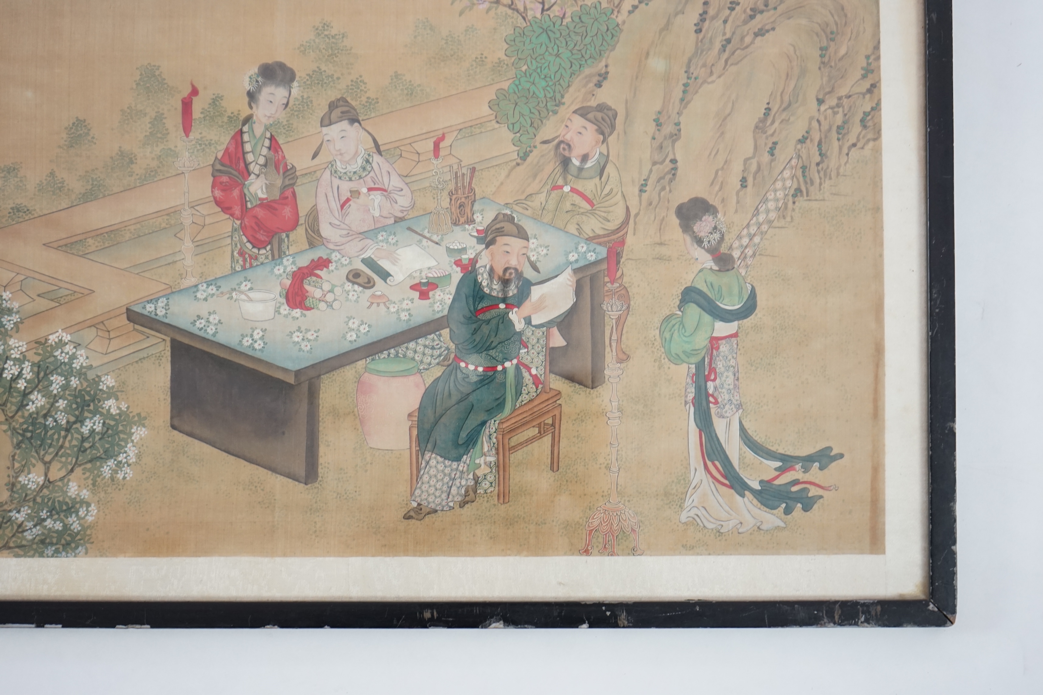 Chinese School, late 19th century, painting on silk, Scholars and attendants in a garden, 35cm x 58cm, framed and glazed. Condition - fair, some general discolouration